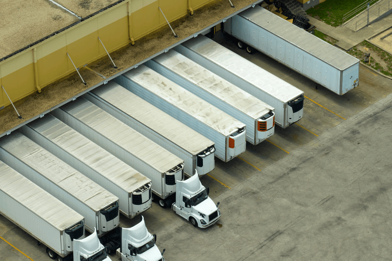 Trailers backed into loading dock bays