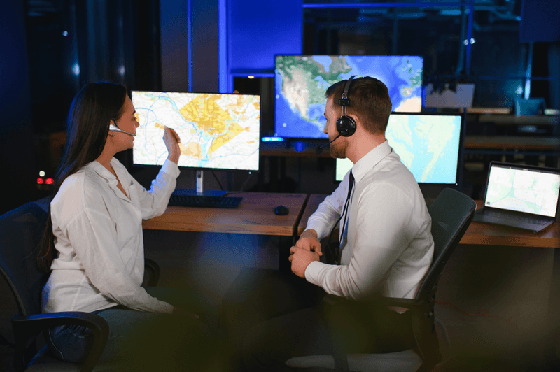 Dispatch team coordinating loads at their screens