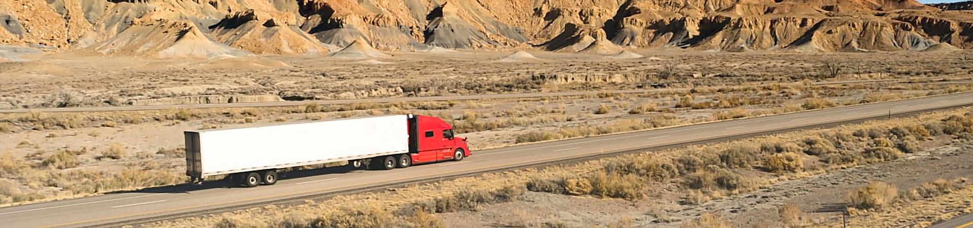 GH Logistics San Antonio OTR team driver truck on the highway